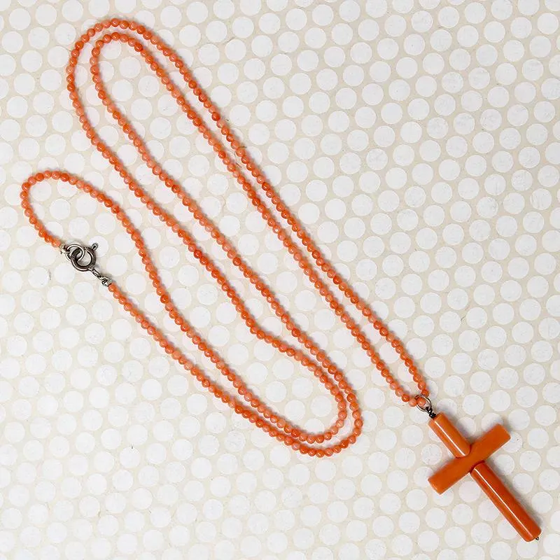 Coral Cross on a 36" Strand of Beads by Ancient Influences