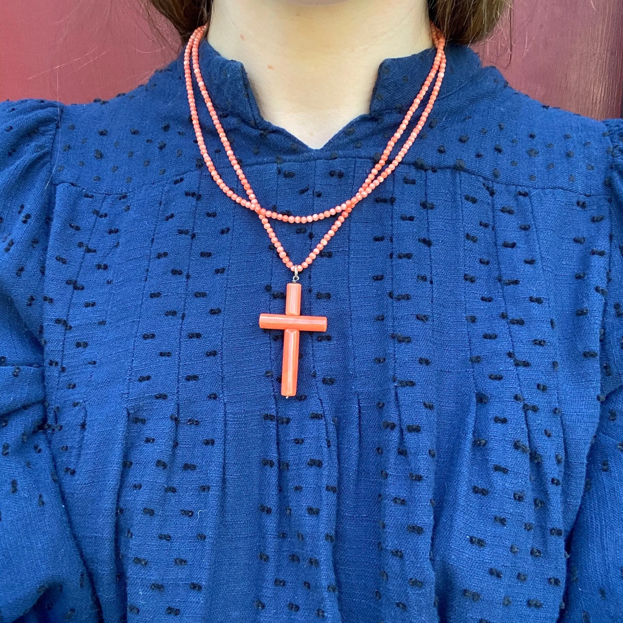 Coral Cross on a 36" Strand of Beads by Ancient Influences