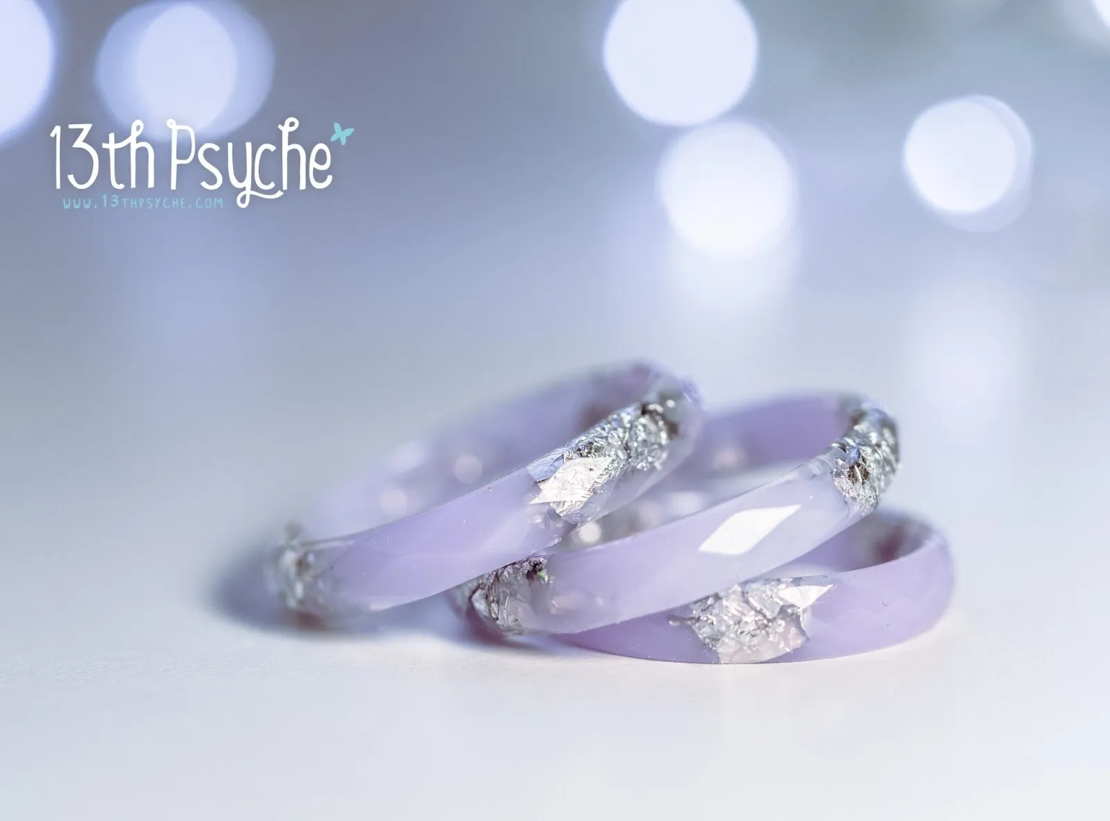 Pastel lilac faceted resin ring with silver flakes