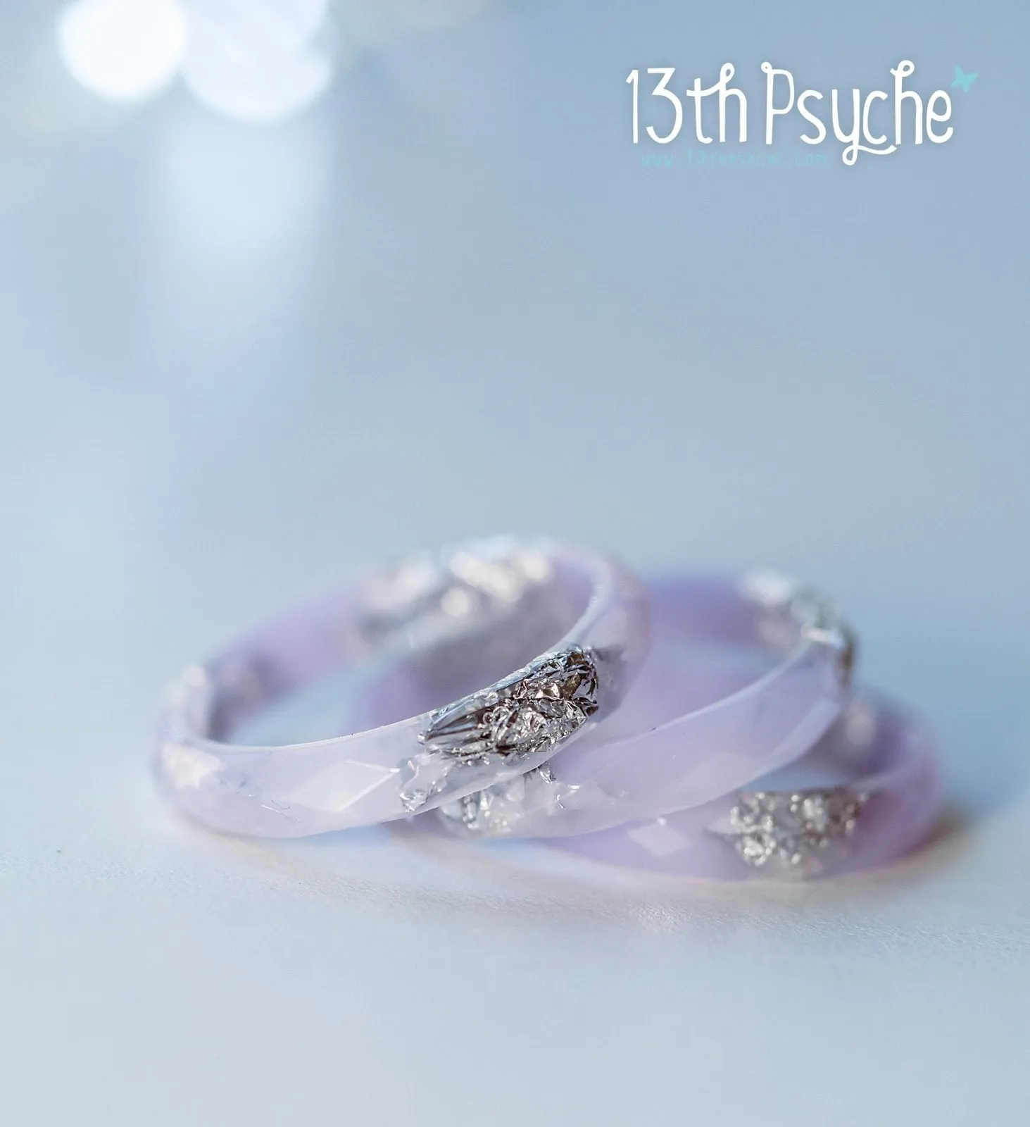 Pastel lilac faceted resin ring with silver flakes