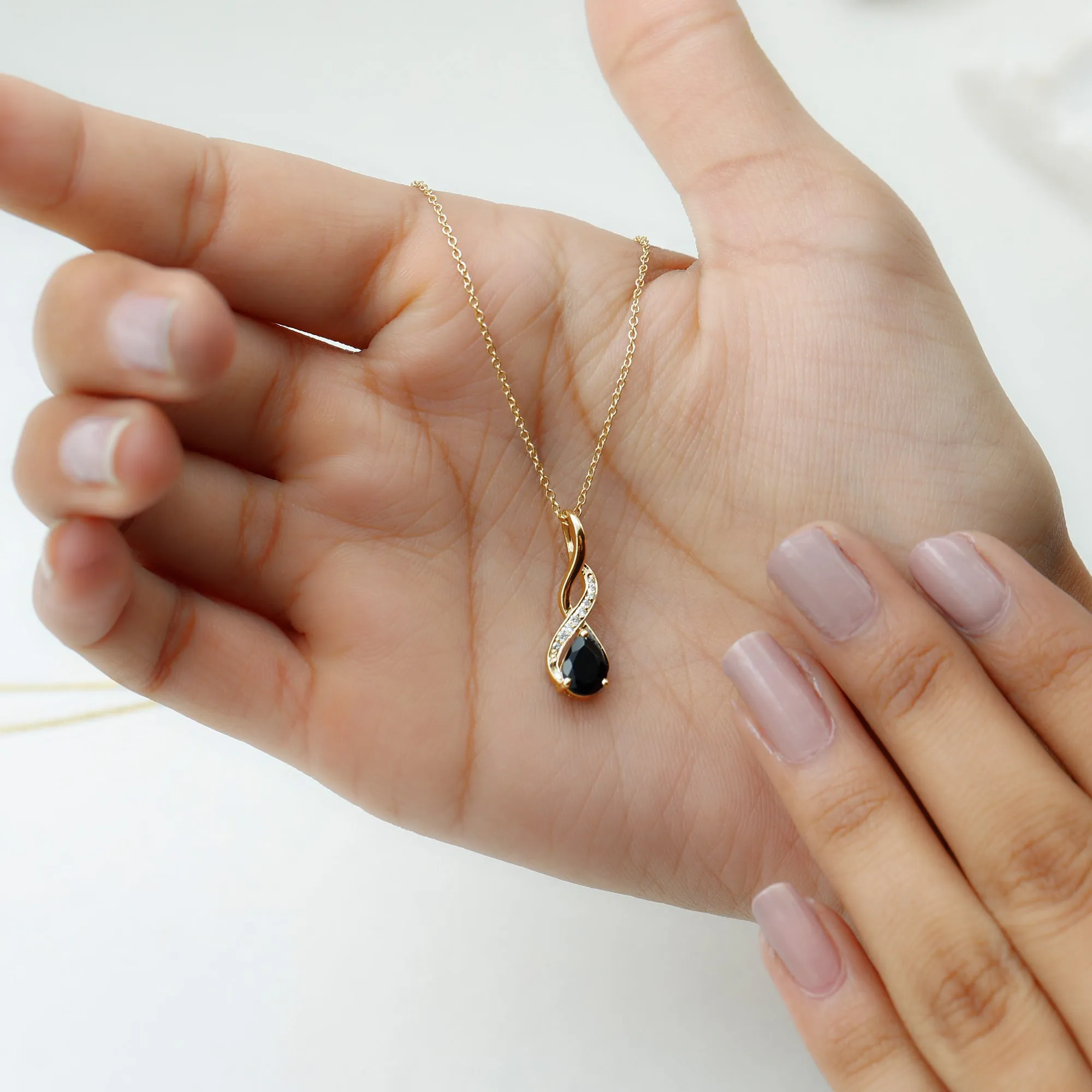 Pear Shape Black Onyx Infinity Pendant Necklace with Moissanite Accent