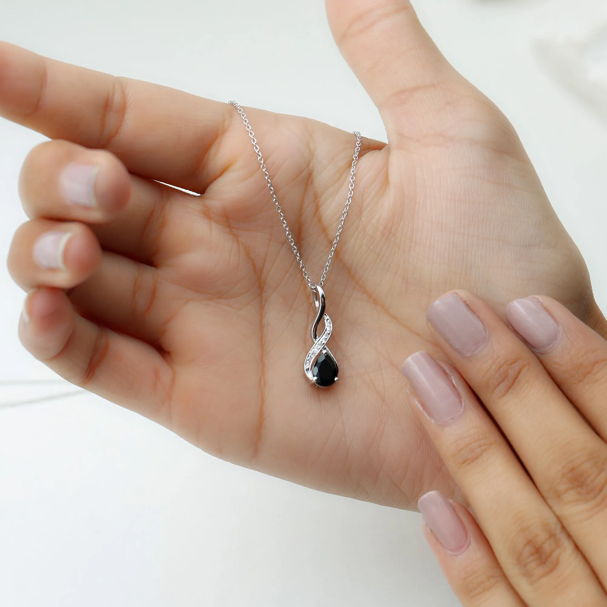 Pear Shape Black Onyx Infinity Pendant Necklace with Moissanite Accent