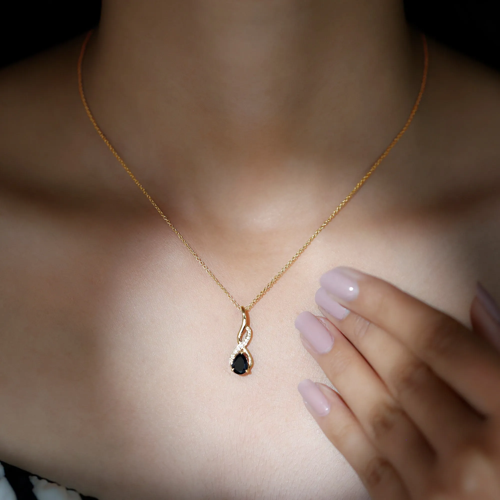 Pear Shape Black Onyx Infinity Pendant Necklace with Moissanite Accent