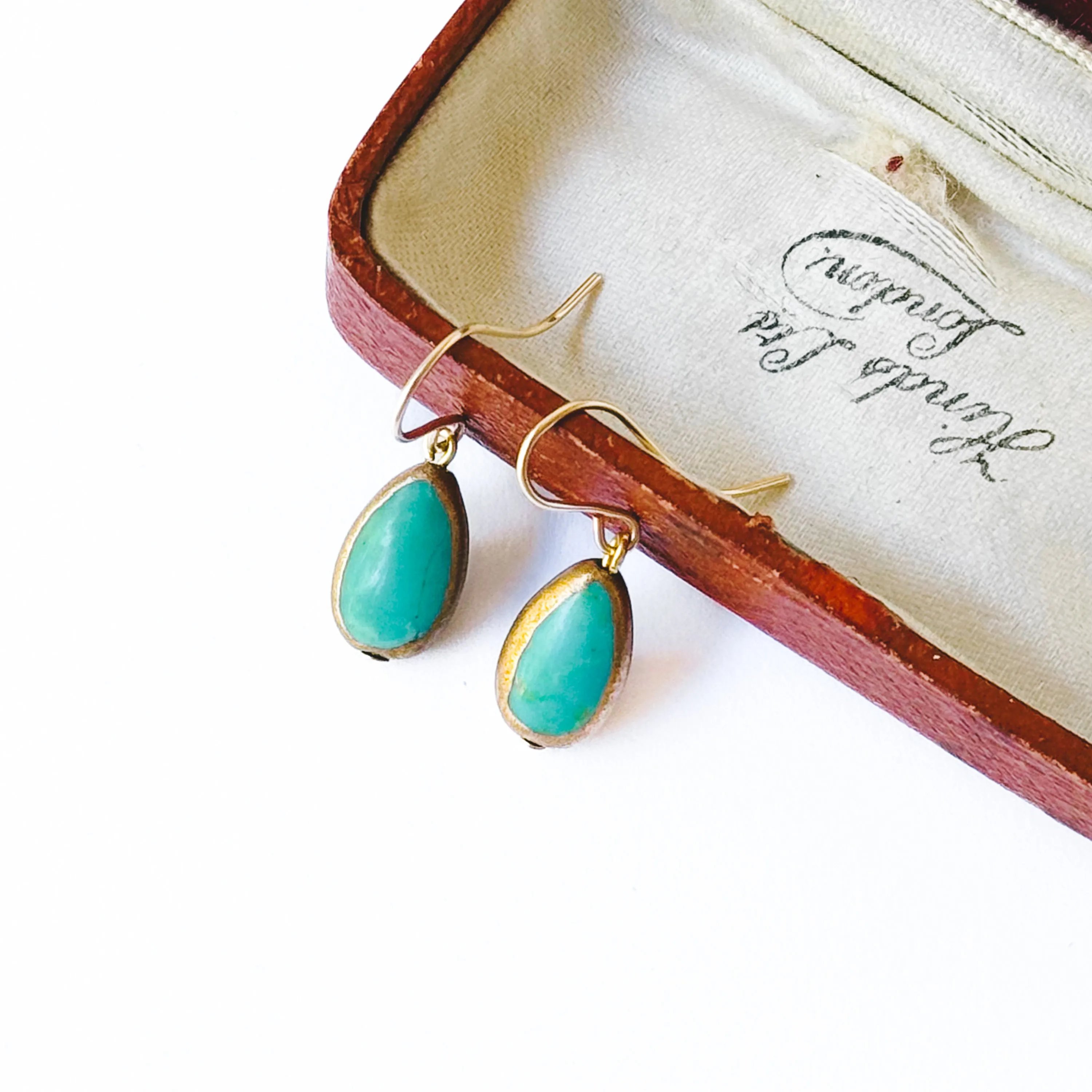 Small Turquoise Teardrop dipped in gold Earrings